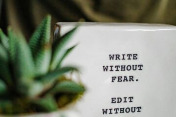 sign saying write without fear. Edit without mercy